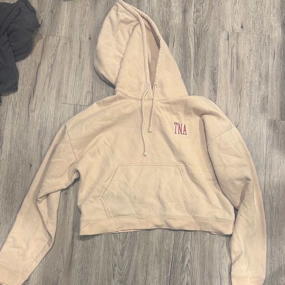 TNA Beige Cropped Hoodie with Red Logo